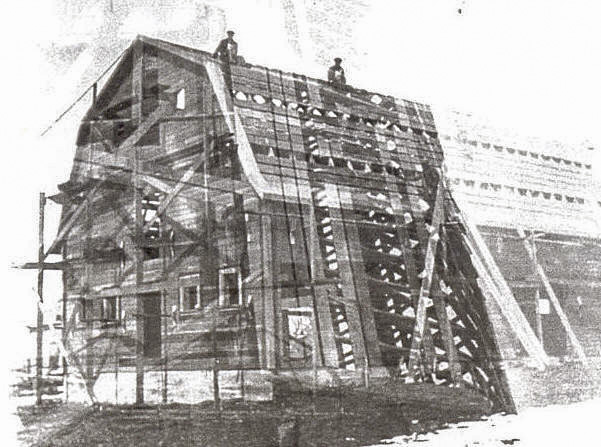 nordstrom barn_1928_barn contsruction_peter nordstrom on roof